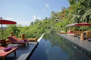 Infinity pool with mountain views