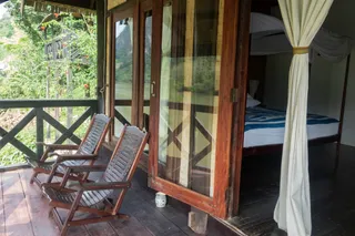 The private balcony overlooking the river