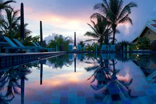 Swimming pool at sunset