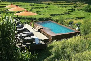 The pool offers beautiful views of the Mae Rim Valley