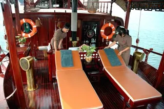 The secluded sundeck offers relaxation and tranquility whilst cruising Halong Bay