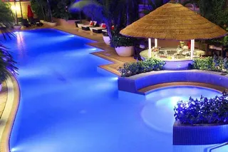 Hotel swimming pool by night