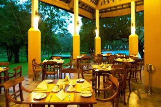 The restaurant is open air and has a lovely view of the gardens