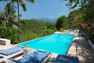 Hotel swimming pool with views across the valley