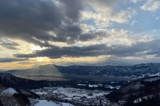 a landscape with snow and mountains
