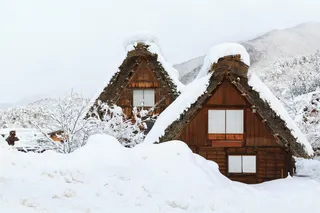 a house covered in snow