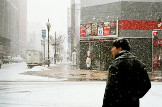 a man walking in the snow